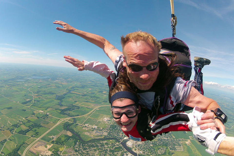 Maggie Paucek during freefall with her tandem instructor
