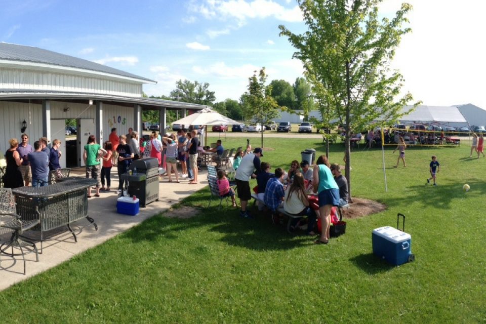A group of people enjoying a picnic at Wisconsin Skydiving Center near Milwaukee, WI