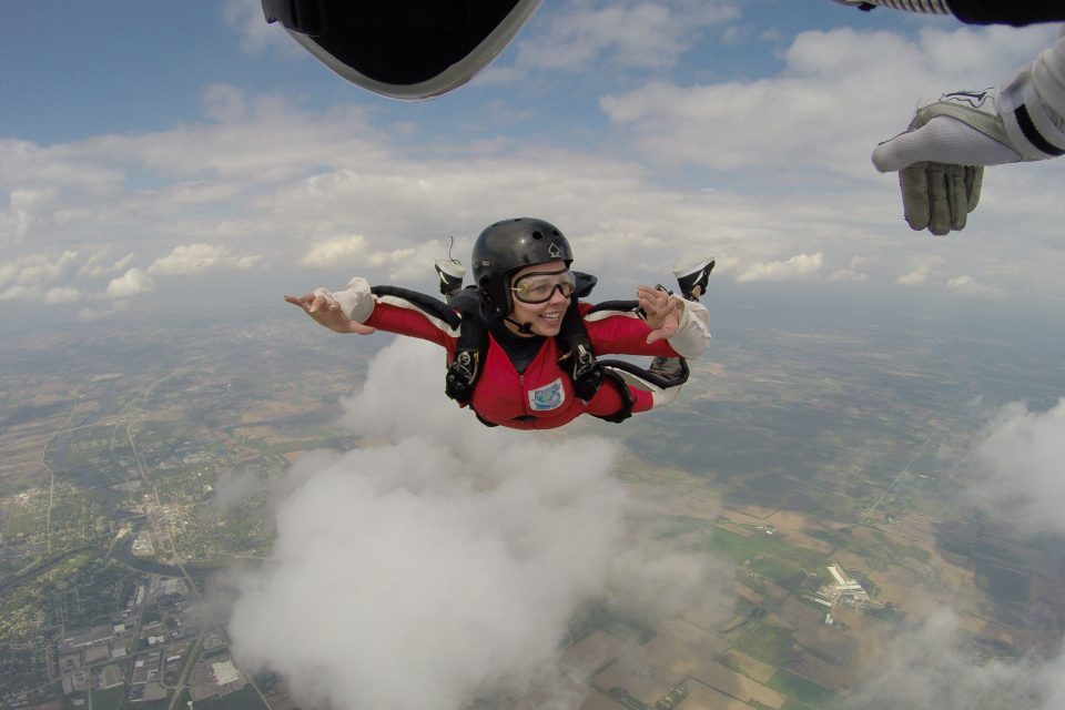 Woman solo skydiving as she trains for her skydiving license at Wisconsin Skydiving Center near Madison, WI