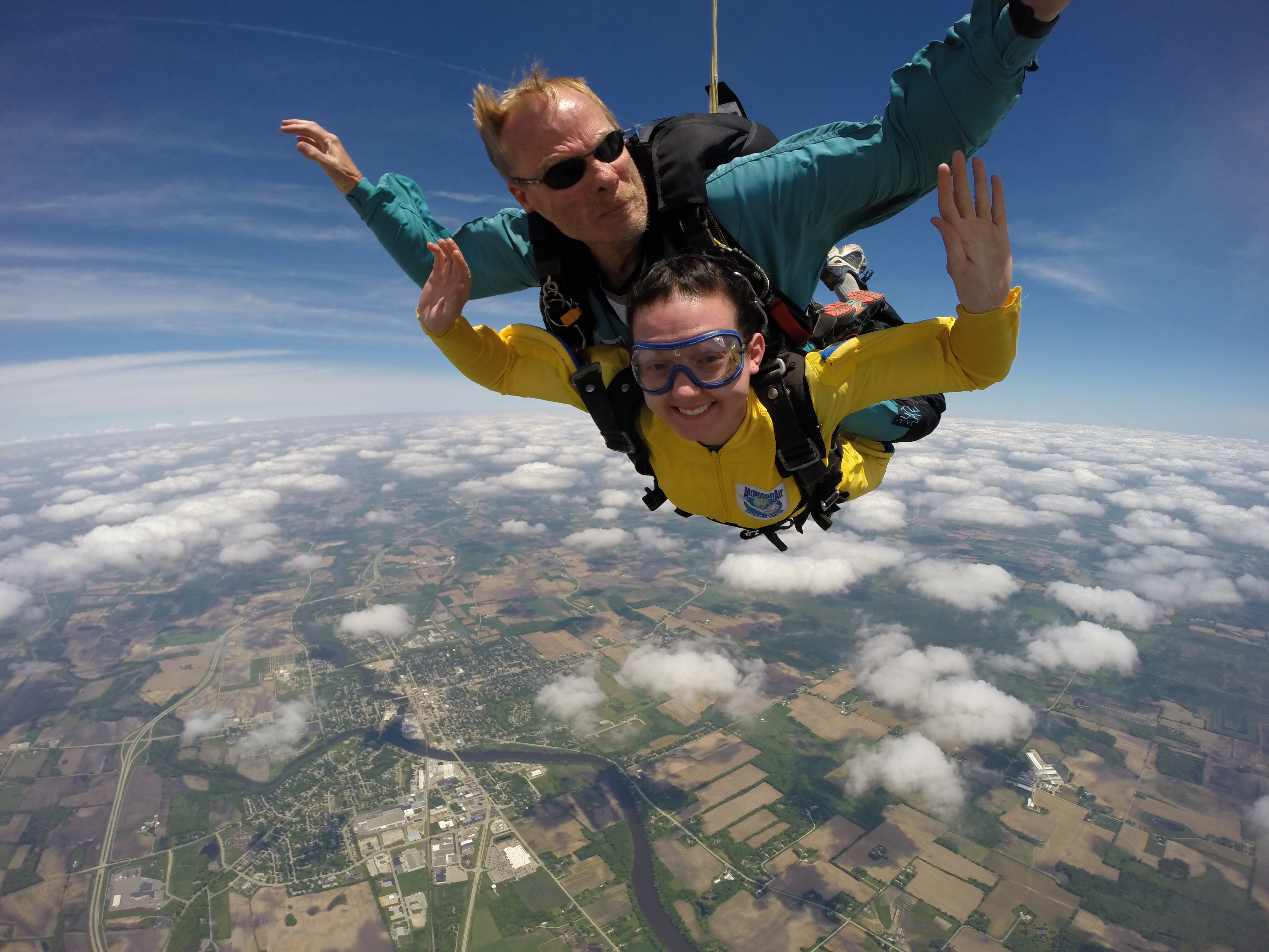Tandem skydiver in the banana pose with arched back at Wisconsin Skydiving Center near Milwaukee