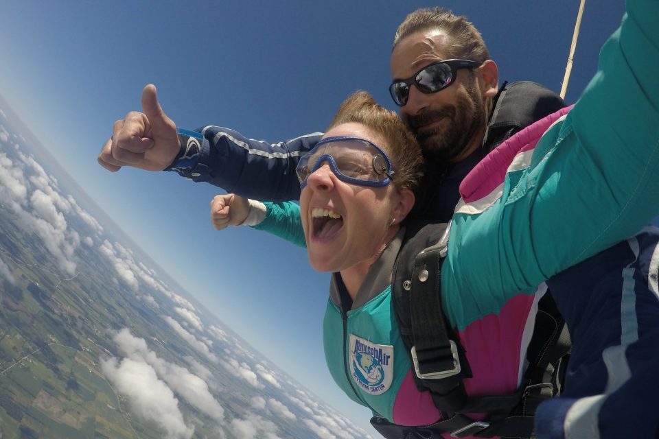 woman is fearless in skydiving freefall at Wisconsin Skydiving Center near Madison, WI