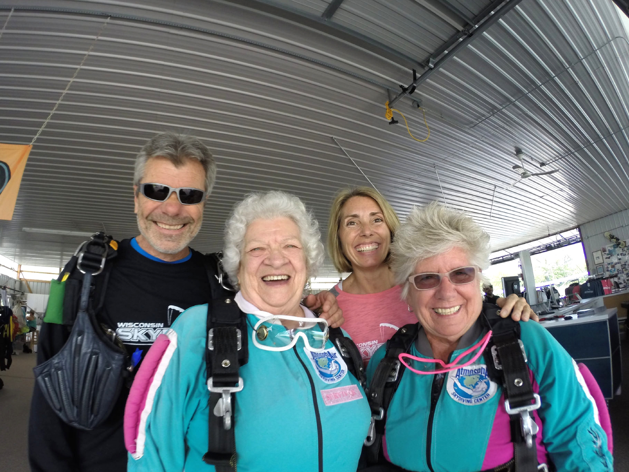 Bo poses with wife Alex and 83 year old skydiver, Anna Mae at Wisconsin Skydiving Center near Milwaukee, WI