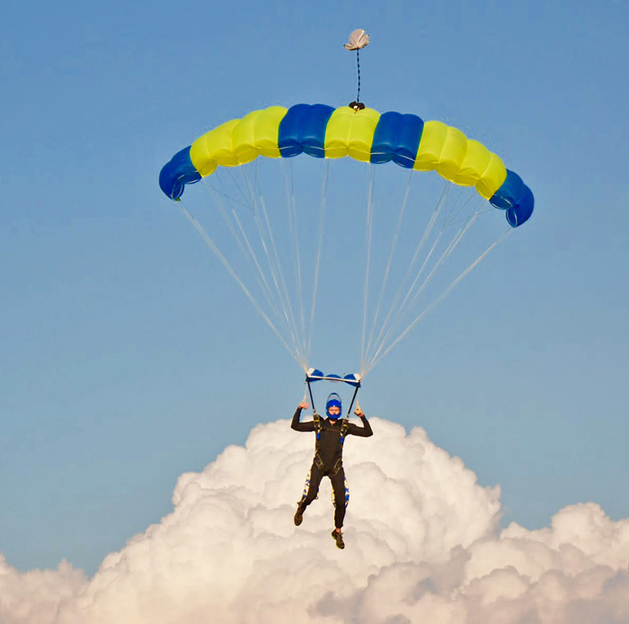 Skydiving instructor Luke Pinion flies under canopy
