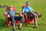 Alex and Bo relax in lawn chairs at the Wisconsin Skydiving Center dropzone