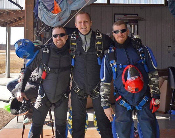 Skydiving instructor Joel Graves with two of his co-instructors.