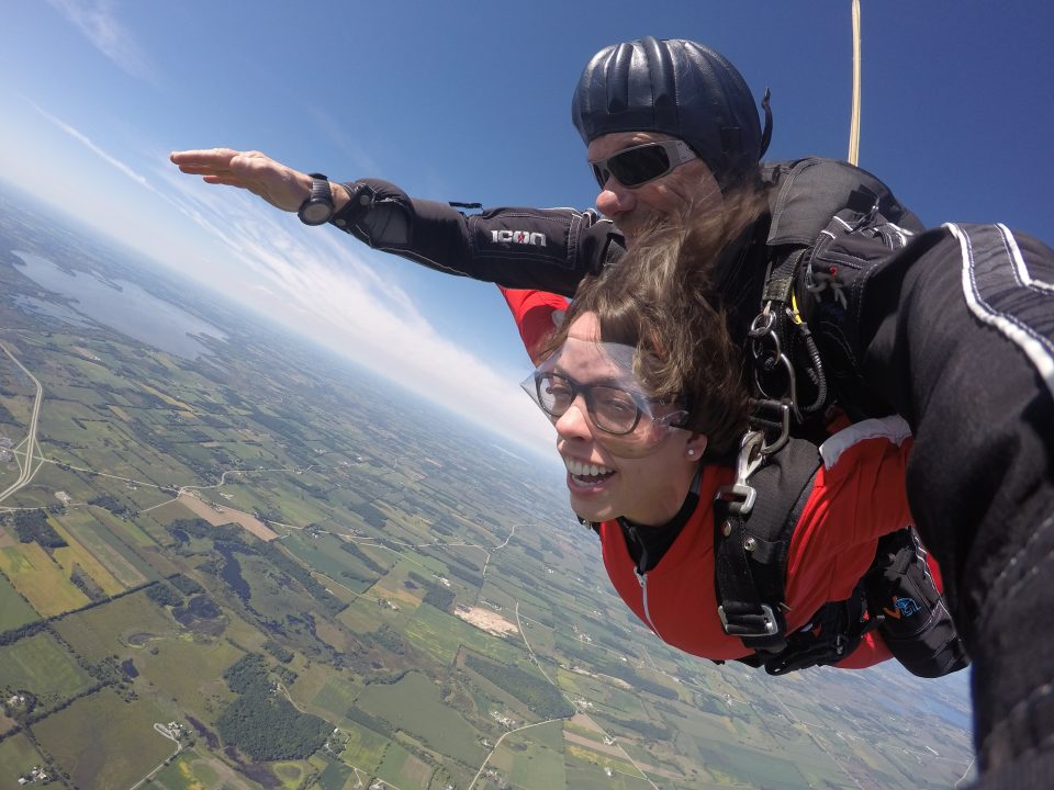 Woman skydiving while wearing glasses at Wisconsin Skydiving Center near Chicago