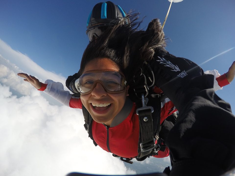  A girl smiles widely during free fall 