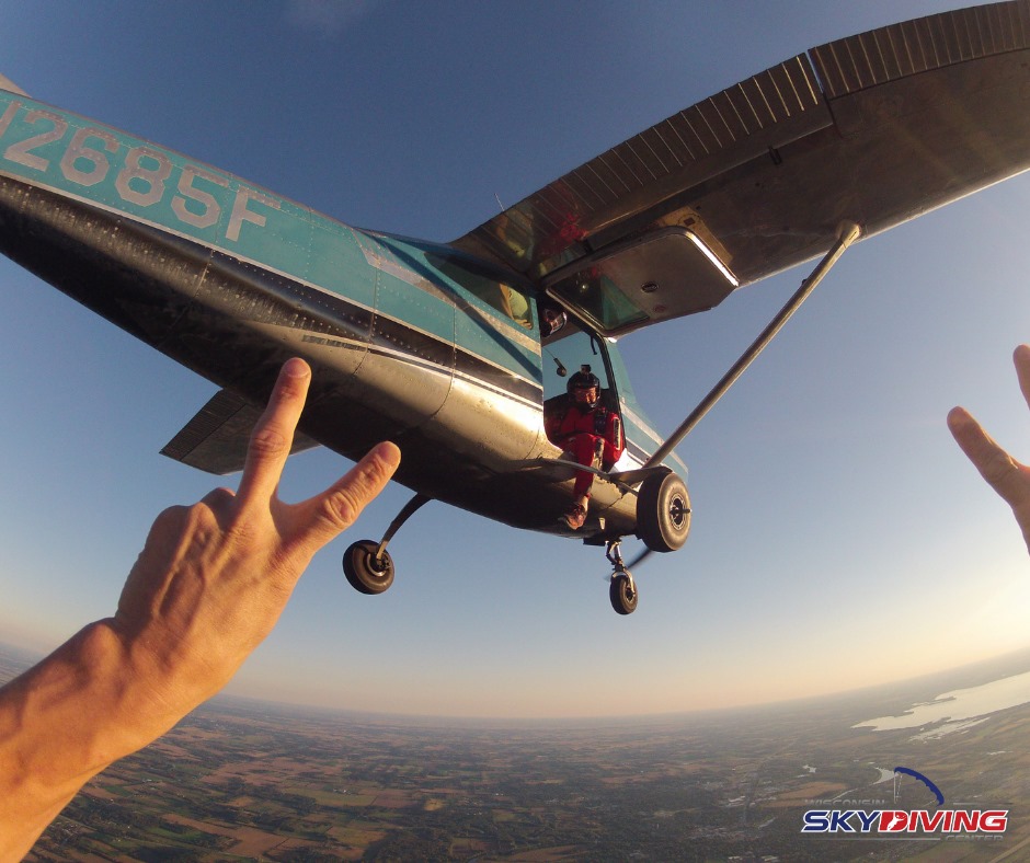 Skydiver saying goodbye to the plane at the end of the season at Wisconsin Skydiving Center near Milwaukee