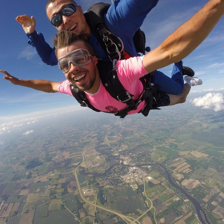 Man smiling during a first time skydive at Wisconsin Skydiving Center near Milwaukee