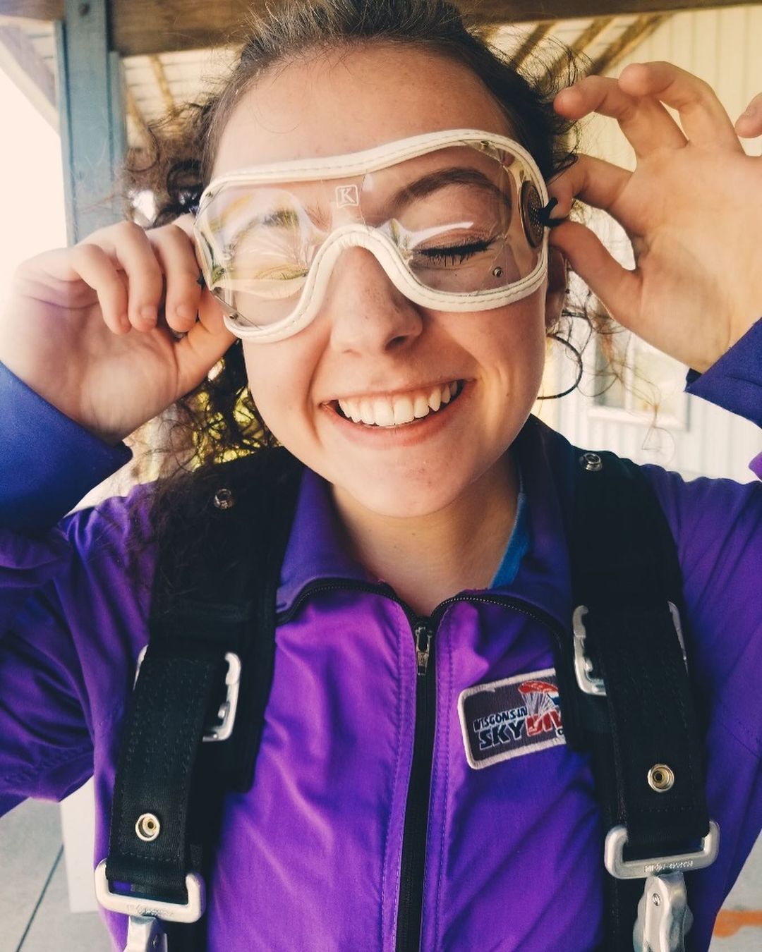 Girl smiling before a tandem skydive at Wisconsin Skydiving Center near Chicago