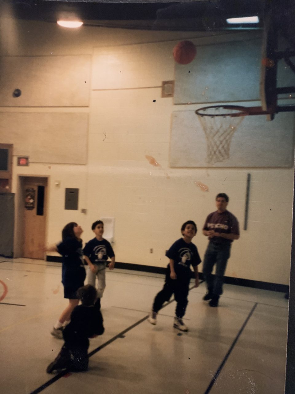 Erica playing basketball when she was a kid