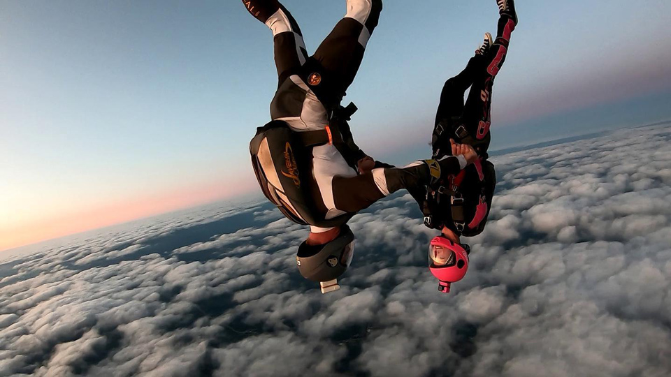 Couple freeflying above the clouds at Wisconsin Skydiving Center near Chicago