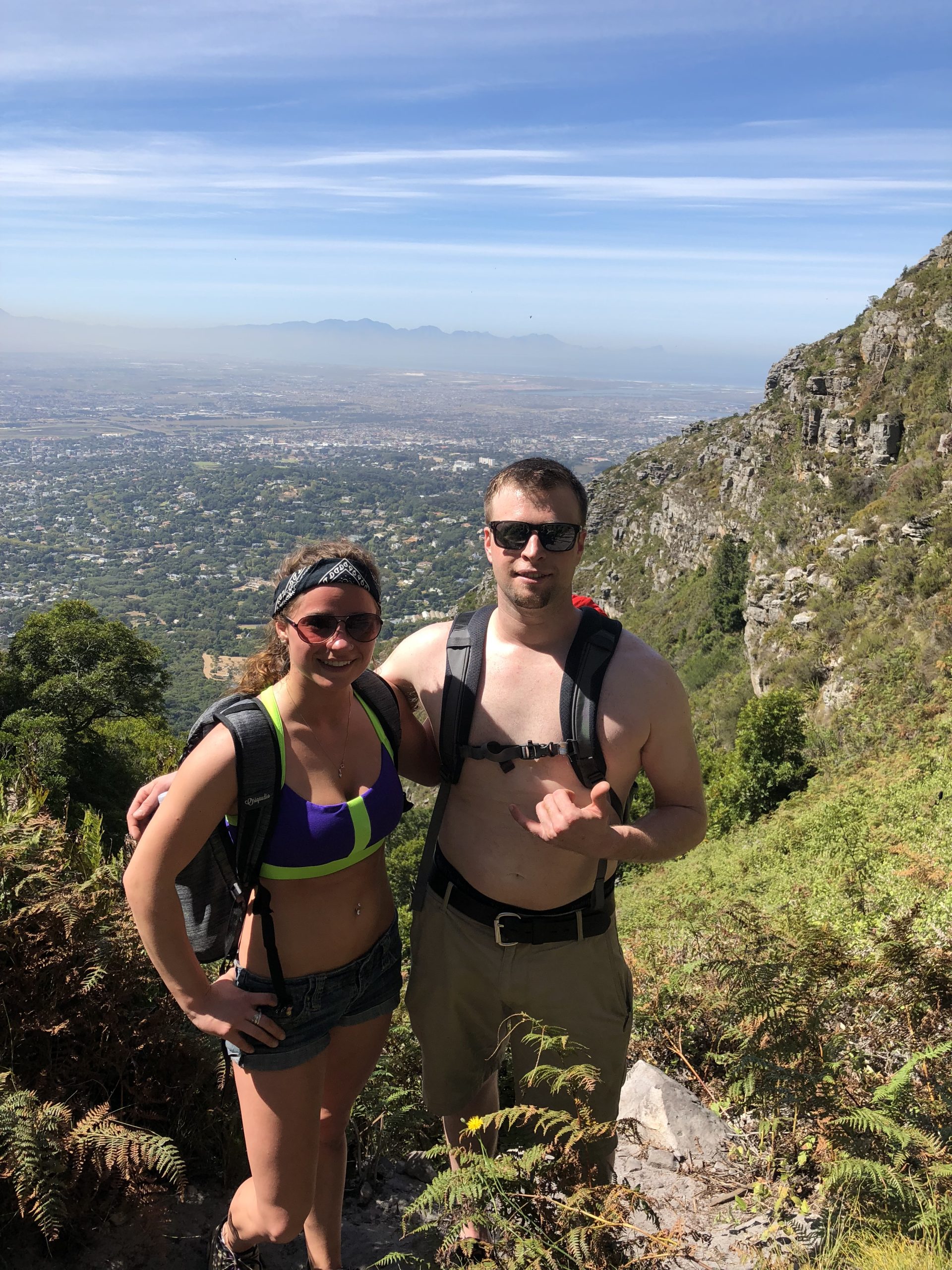 Shirtless couple hiking in South Africa