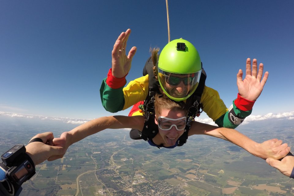 First-time tandem skydiver jump from a height of 10,000 feet