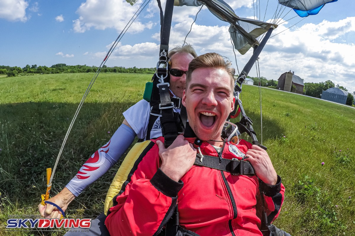 Man landing after first amazing tandem skydive at Wisconsin Skydiving Center near Chicago