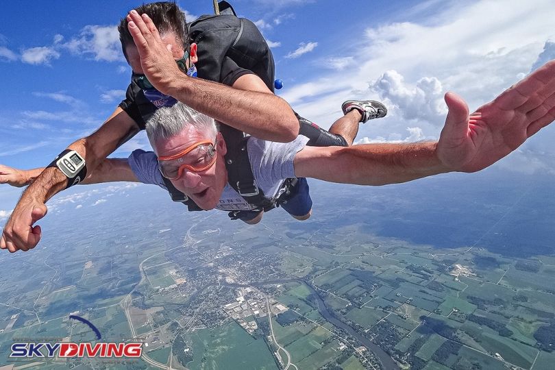 Man excited during tandem skydiving freefall at Wisconsin Skydiving Center near Chicago