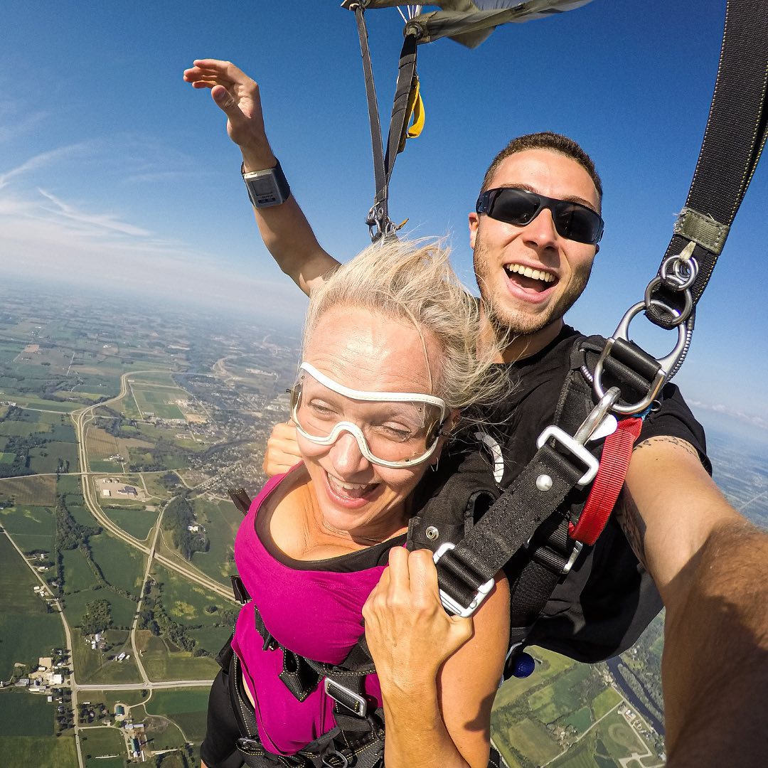 Woman enjoying tandem freefall after her first skydive at Wisconsin Skydiving Center