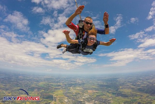 Woman in freefall during tandem after jumping from a plane at Wisconsin Skydiving Center near Chicago