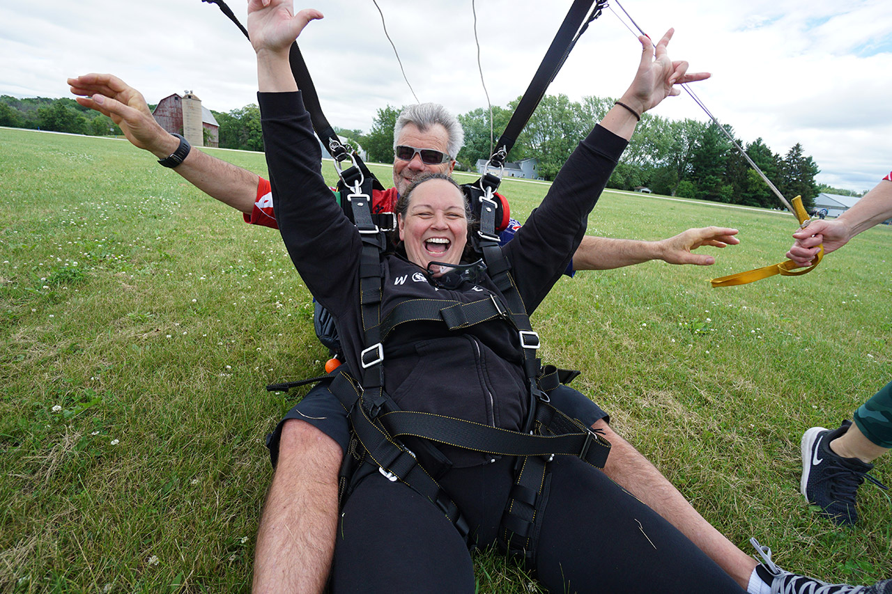 First time tandem skydiver happy she got video of her first skydive at Wisconsin Skydiving Center near Milwaukee