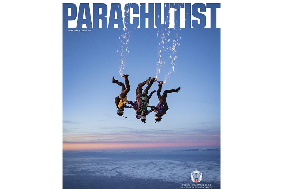 Cover photo from the magazine Parachutist of 4 skydivers flying head down