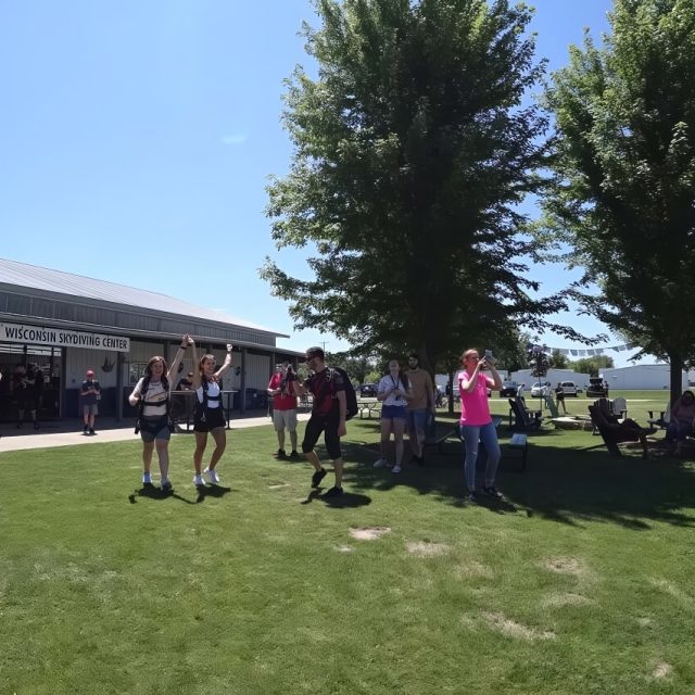 Group of skydivers and supporters enjoying the grounds at Wisconsin Skydiving Center