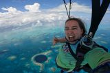 Sara Kutcher skydiving over Blue Hole in Belize