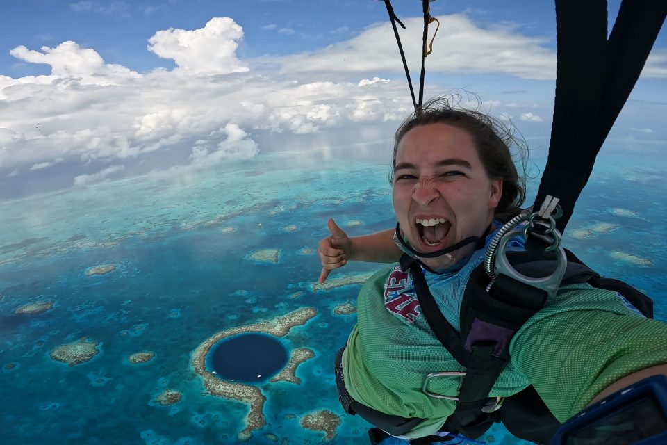 Sara Kutcher skydiving over Blue Hole in Belize