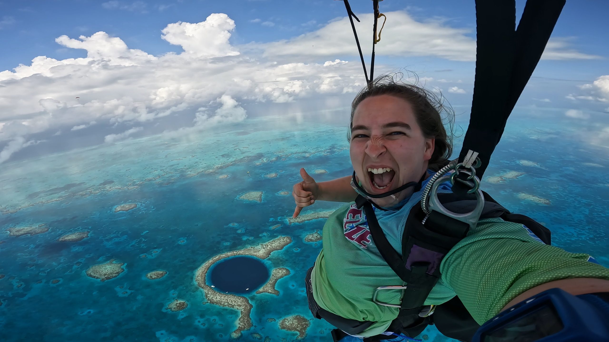 Sara Kutcher skydiving over Blue Hole in Belize